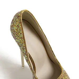 Close-up detail of shimmering multi-color glitter sequins on high heel stiletto pumps