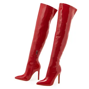 Red patent leather over-the-knee boots with pointed toe and stiletto heels for women