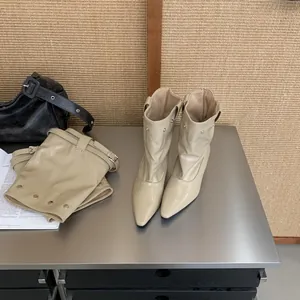 Western beige pointed-toe wedge boots with detachable gaiter-style pant-tube sleeve