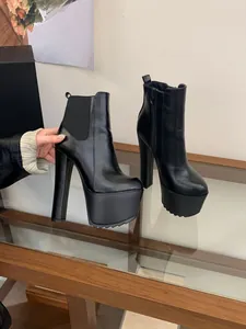 Side detail view of 16cm black high heel platform chunky Chelsea boots with side zipper