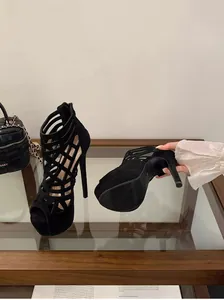 Macro view of 16cm platform high heels with fashionable cutout design and thin stiletto heel.