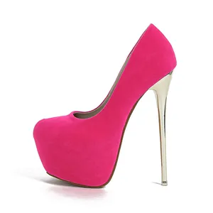 Detail view of fuchsia suede platform pumps with high metallic gold stiletto heel
