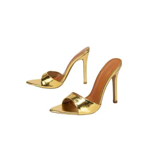 Elegant gold metallic stiletto sandals with pointed toe, perfect for parties and events.
