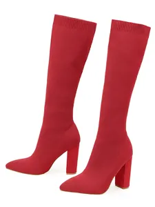 Elegant red knitted stretch thigh-high boots with chunky high heels and pointed toe design