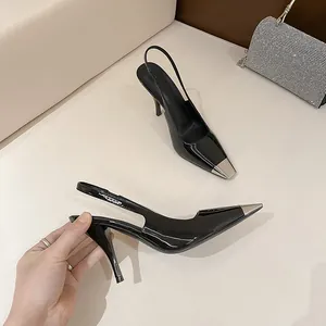 Elegant black patent leather slingback high heels with square metallic silver toe cap