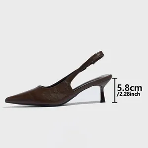Close-up detail of dark brown pointed toe slingback pumps with a 5.8cm kitten heel