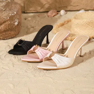 Elegant pointed toe stiletto mule sandals in black, pink and cream satin with gold beads.