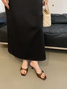 Chic brown kitten heel mules with square toe and rhinestone buckle detail