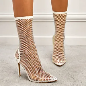 Elegant white fishnet mesh stiletto ankle boots with sparkly rhinestones and pointed toe