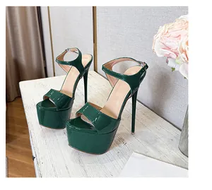 Close-up side view of dark green patent leather platform sandals with stiletto heels.