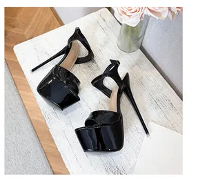 Black patent leather platform stiletto sandals displayed on a textured white surface.