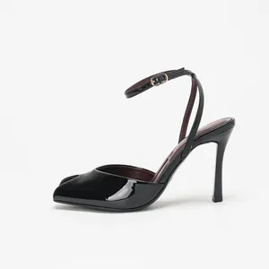 Elegant black patent leather peep-toe high-heel sandals with adjustable ankle strap.