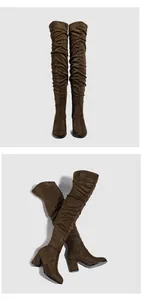 Elegant brown suede thigh-high boots with stylish block heels and side zipper detail