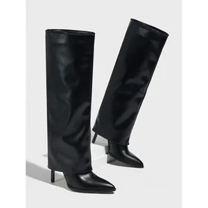 Black pointed toe stiletto high boots with unique wide fold-over pant-leg shaft design