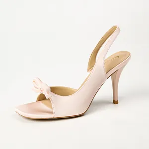 Elegant pink satin high heel sandals with bow detail and slingback strap for women