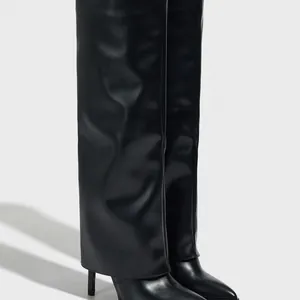 Pointed toe stiletto fold-over high boots in black leather with wide pant-leg design
