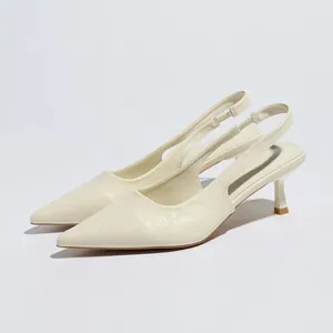 Elegant cream pointed-toe slingback shoes with low kitten heels for stylish women