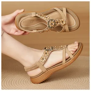 Bohemian sandals with floral buckles and elastic strap, showing shoe detail and on-foot view