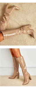 Detailed view of beige crocodile embossed patent leather chunky heel tall boots