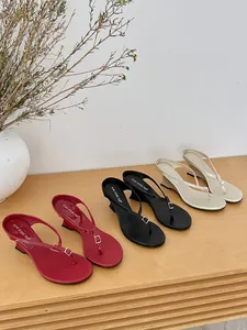 Collection of minimalist French wedge flip-flop sandals in red, black, and beige