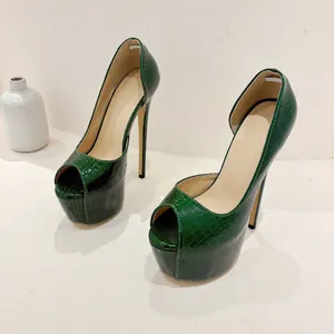Close-up of green crocodile texture 16cm peep-toe platform high heels for runway.