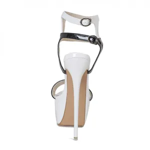 Back view detail of 16cm white and black stiletto platform sandals with ankle straps.