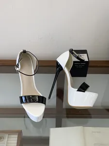 Detail view of sexy 16cm white platform stiletto sandals with black ankle strap detail