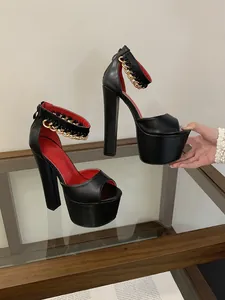 Elegant black chunky platform high heels with gold chain strap for stage performance