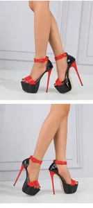 Sexy red and black patent leather platform sandals with ultra-high stiletto heels detail.