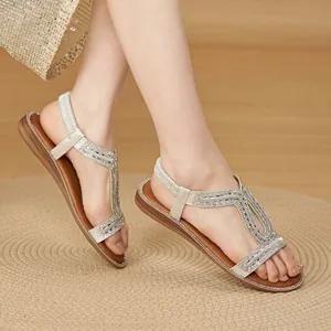 Sandali piatti bohémien vintage con strass e cinturino elastico stile gladiatore