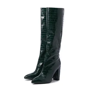 Dark green crocodile embossed knee-high boots with pointed toe and chunky high heels side view