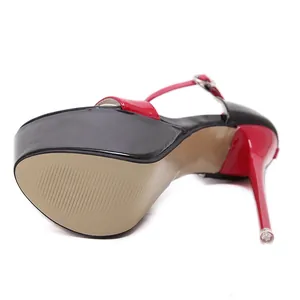 Macro view of 16cm patent leather platform sandal featuring sole and stiletto heel