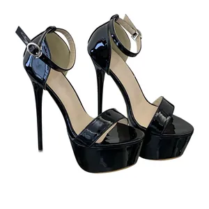 Side view of black patent leather platform sandals with 16cm stiletto heel and ankle strap
