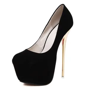Elegant side view of black suede platform pumps with striking gold stiletto high heels