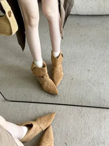 Chic brown suede pointed toe ankle boots with crossover strap and low block heel