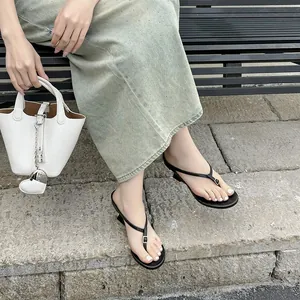 Retro black thong sandals with kitten heel for summer outdoor wear, elegant style.