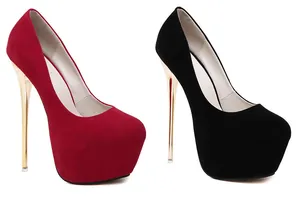 Detailed view of sexy red and black suede platform pumps with elegant gold stiletto heels