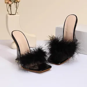 Sexy black high heel sandals with elegant faux fur trim and sleek transparent heels