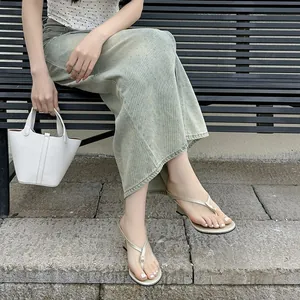 Elegant women's wedge thong sandals in champagne gold finish for summer outdoor wear