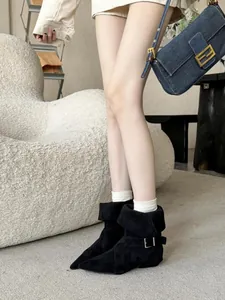 Elegant black suede pointed toe short boots for women with stylish buckle details.