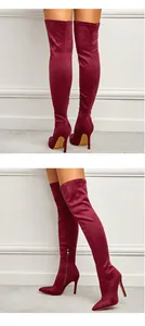 Rear and side views of elegant burgundy over-the-knee boots with slim stiletto heels