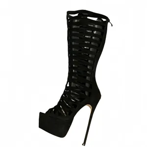 Detail view of black sexy hollow gladiator high heel boots with stiletto and platform