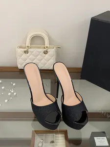 Elegant black glitter peep-toe platform mules featuring ultra-thin high heels for women