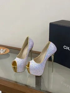 Close-up detail of iridescent sequin peep-toe pumps featuring gold platform and stiletto heels