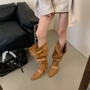 Brown suede western cowboy slouchy boots with decorative buckle straps and pointed toe