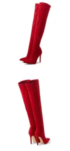 Close-up of red stiletto thigh high boots showing front and side profile views.