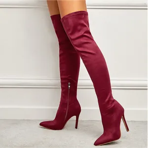 Elegant burgundy over-the-knee stretch boots with stiletto high heels and pointed toe