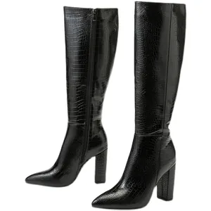 Elegant black crocodile embossed knee high boots with chunky high heels
