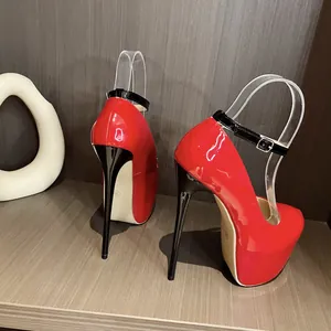 Side view of red 16cm platform stilettos with black ankle straps and high heels.
