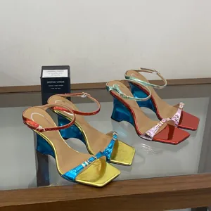 Metallic color-block wedge sandals with a unique heel design and square toe